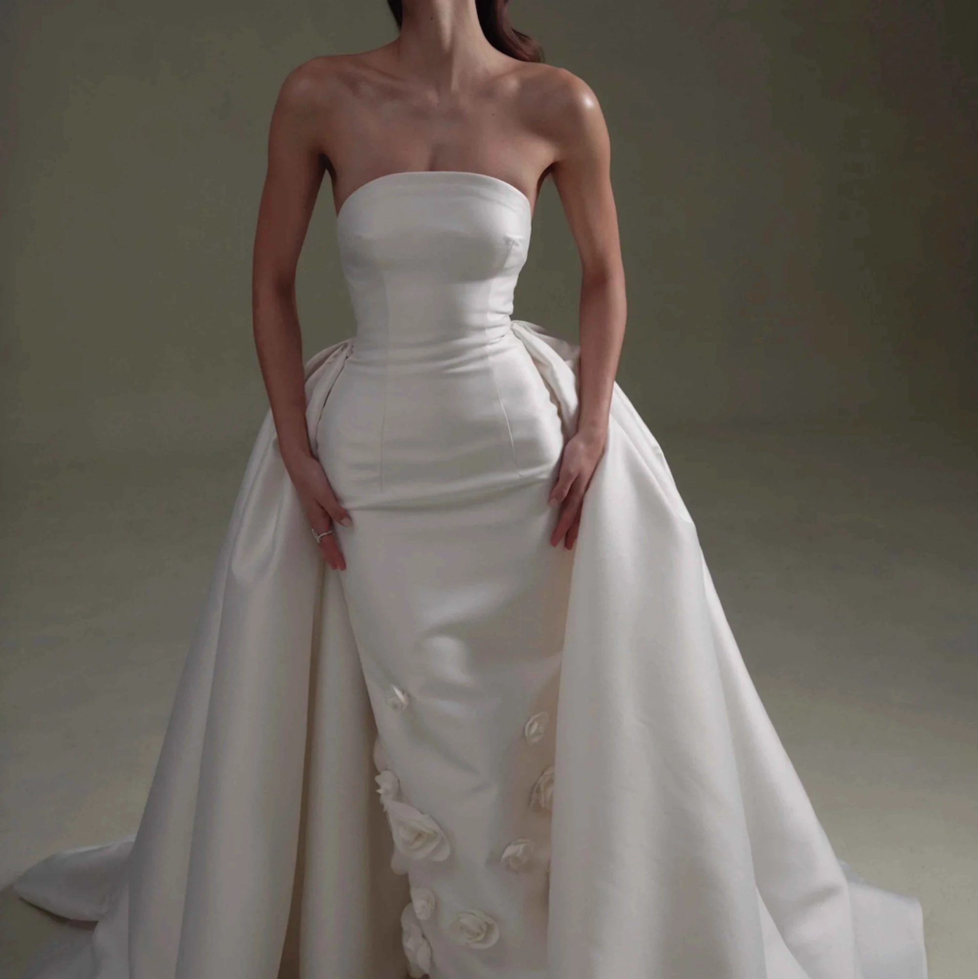 Model wearing white Senstudio dress