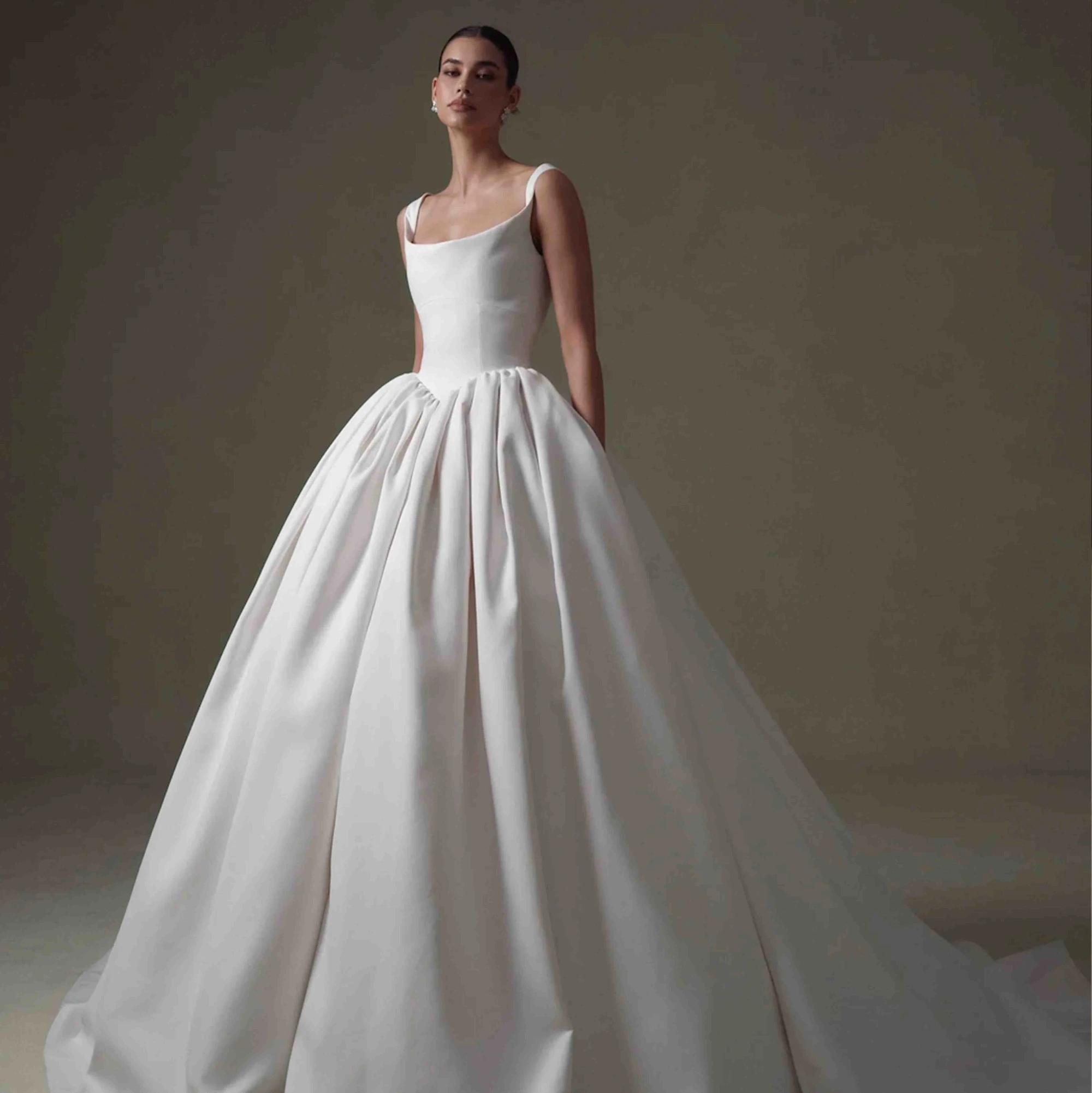 Model wearing white Senstudio dress